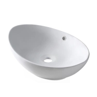 Umywalka nablatowa Balneo Zerra 59 x 39 cm biała ceramiczna z przelewem w kolorze białym